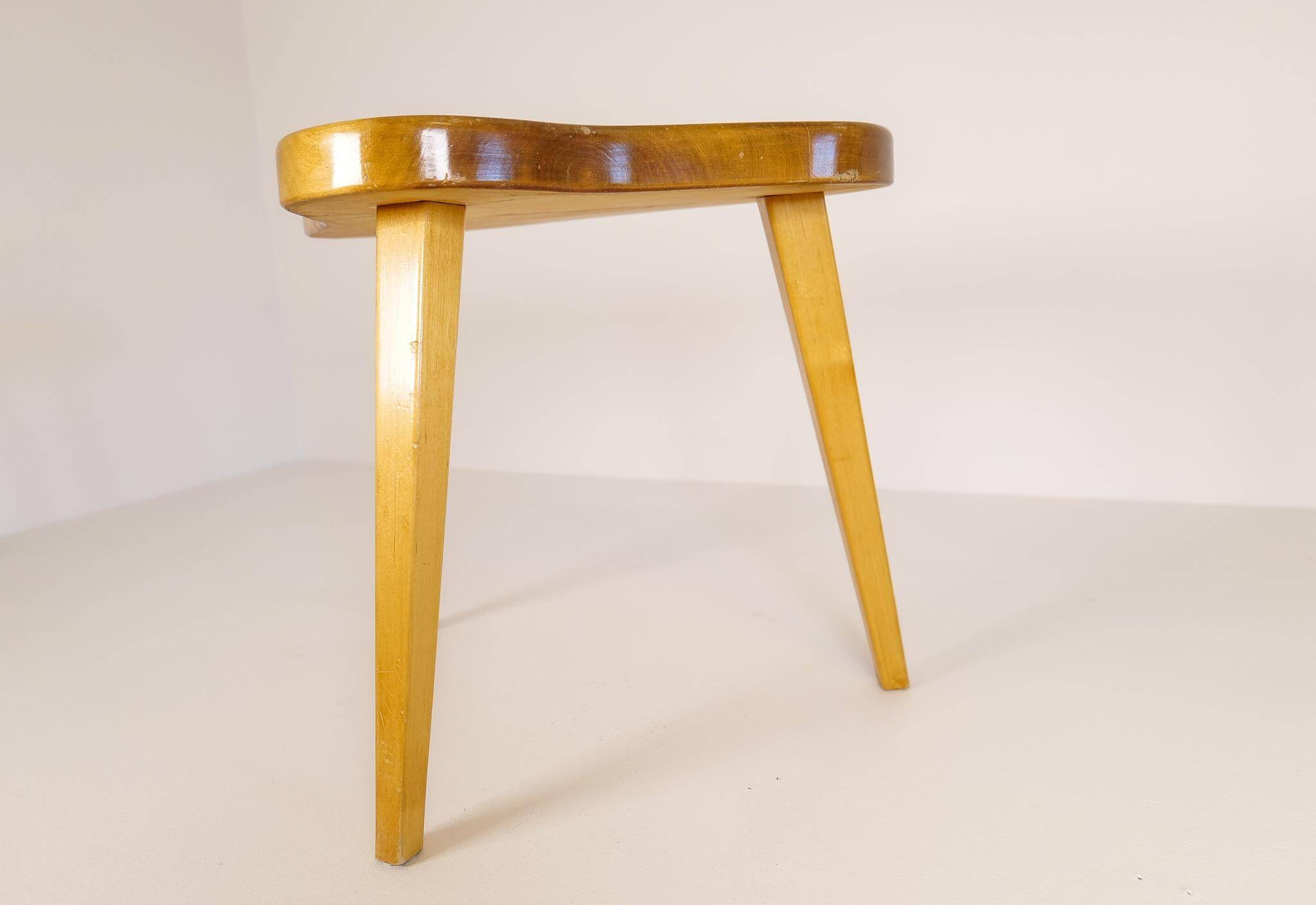 Modern Swedish Scandinavian stool in lacquered birch, 1970s.