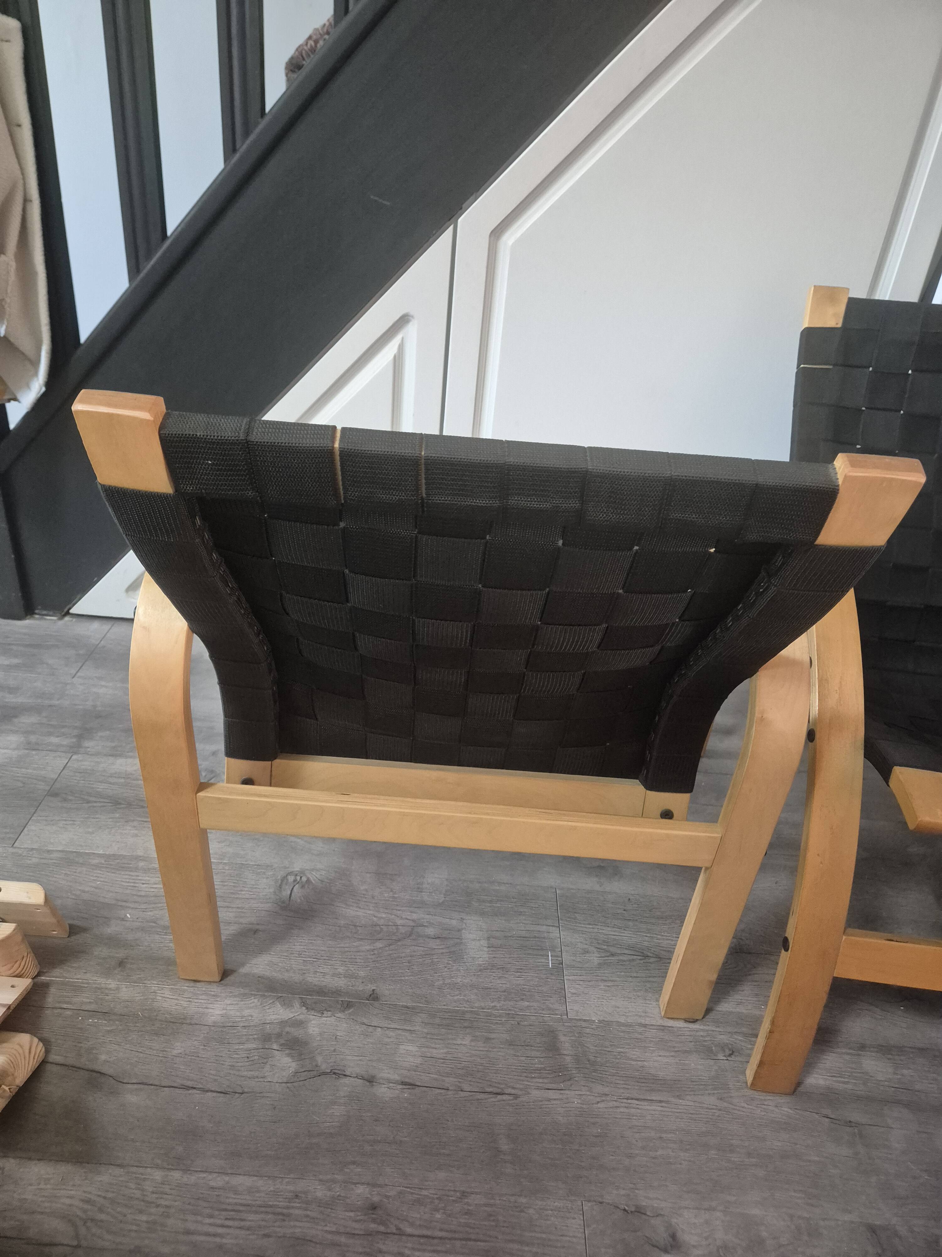 pair set of 2 armchairs with a wooden frame and black fabric weaving