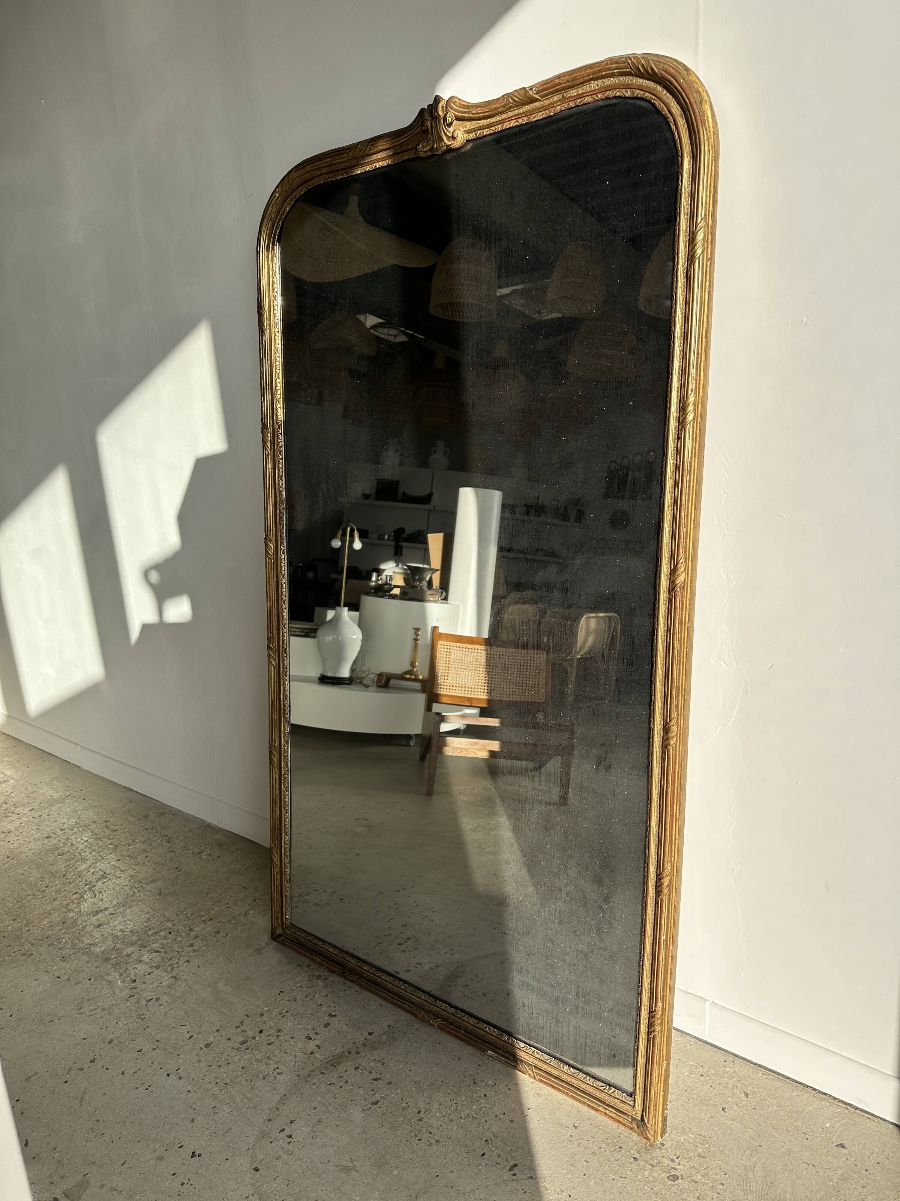 Large gilded mirror 19th century rounded corners mercury glass Louis XVI style