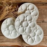4 assiettes à huîtres en barbotine blanche