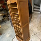 1950s oak office storage cabinet with curtains.