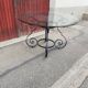 Table fer forgé et plateau verre