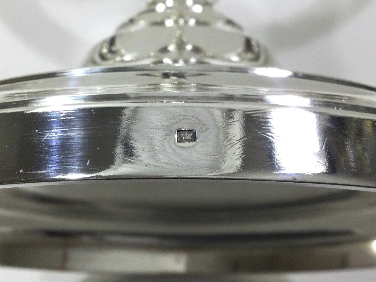 Pair of silver bronze candelabras