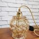 Old vintage hanging lamp stroller in moulded glass