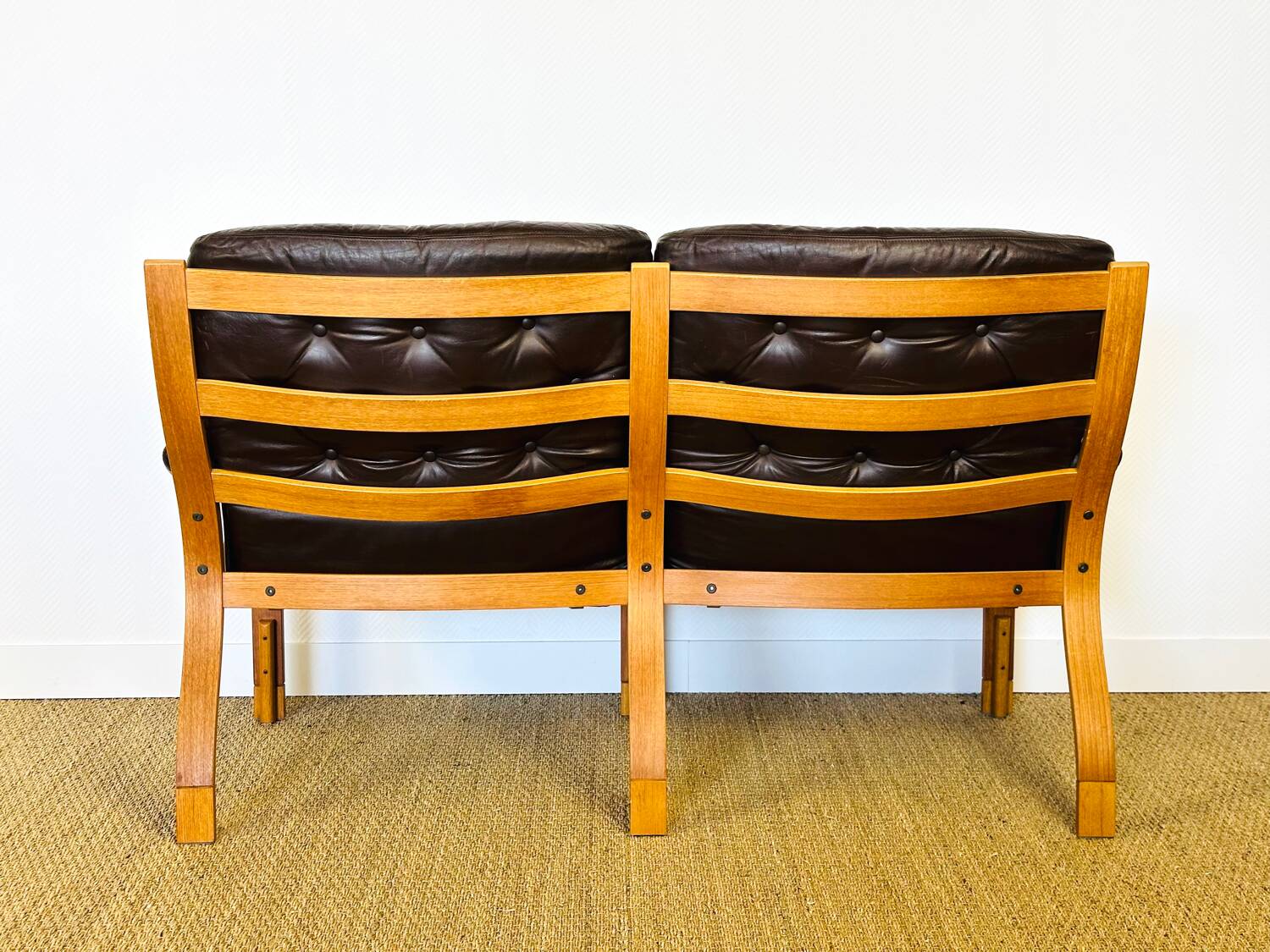 Scandinavian leather and teak bench from the 1960s.