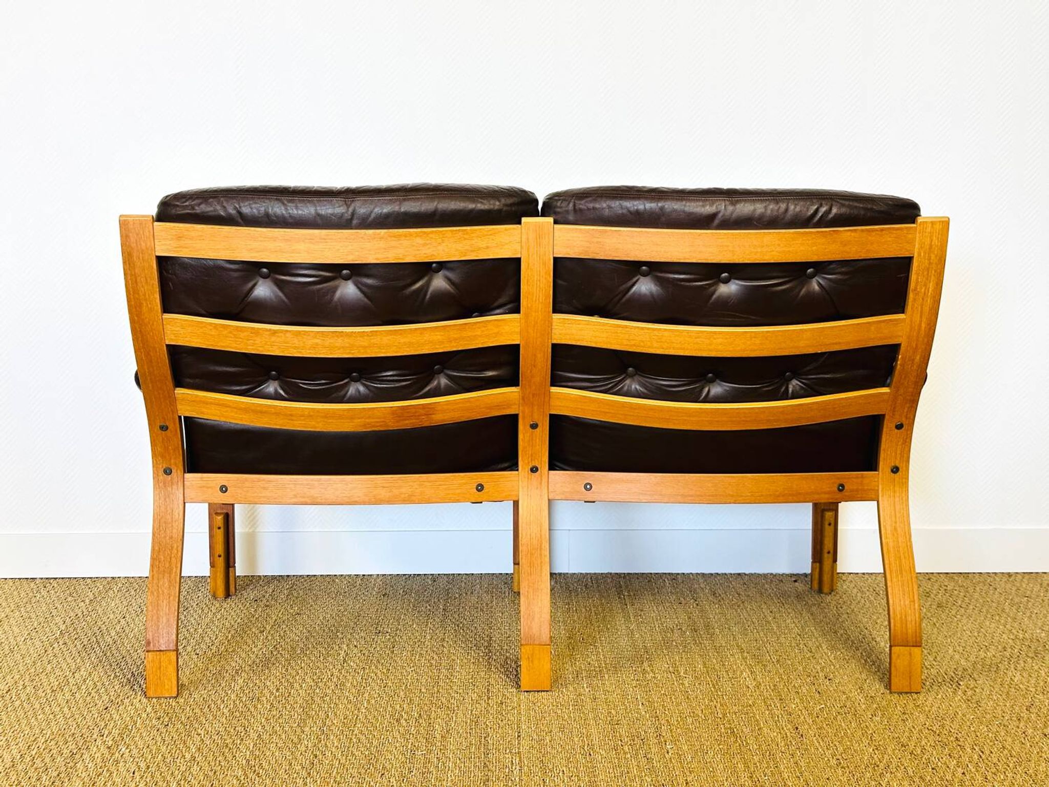 Scandinavian leather and teak bench from the 1960s.