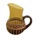 Pitcher dressed in wicker