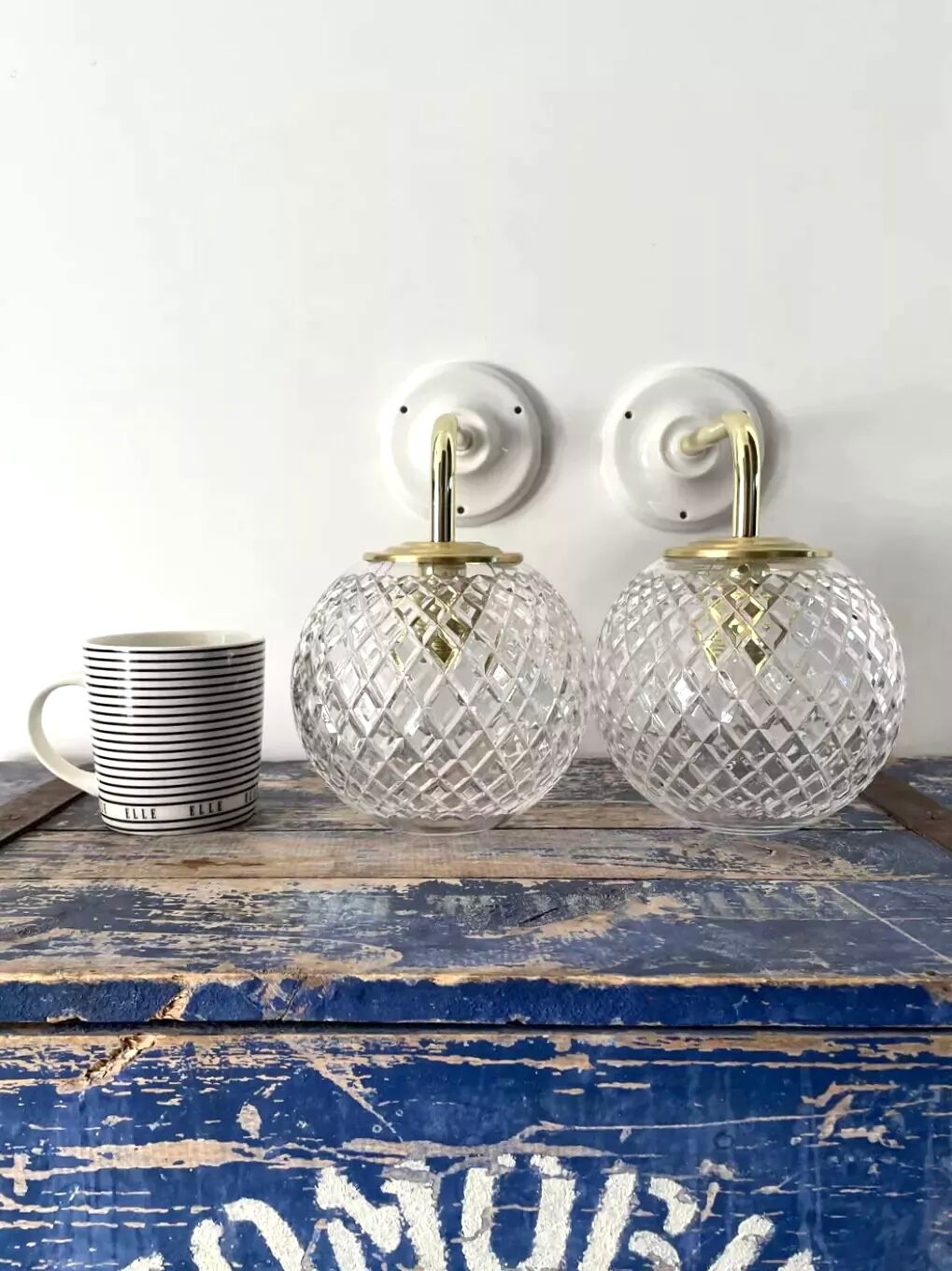 Pair of brass and glass wall sconces