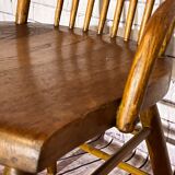 Wooden armchair with high back