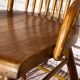 Wooden armchair with high back