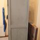 Antique glass-fronted cabinet in pearl grey – country house spirit