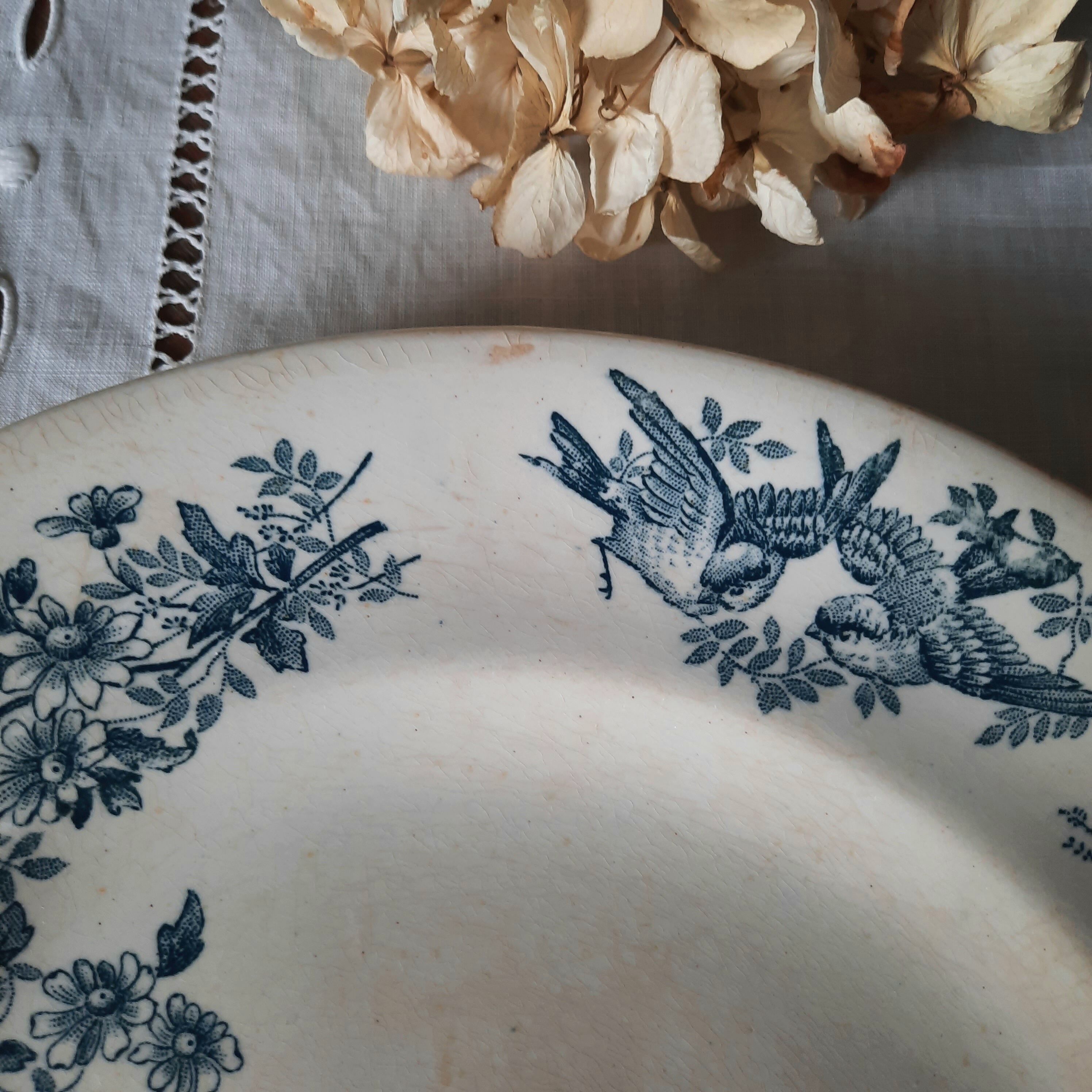 Old flat plates mismatched in earthenware