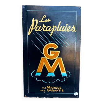 GM Umbrellas metal sign