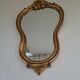Miroir doré en bois style baroque