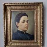 Oil on canvas portrait in an antique gilded wooden frame.