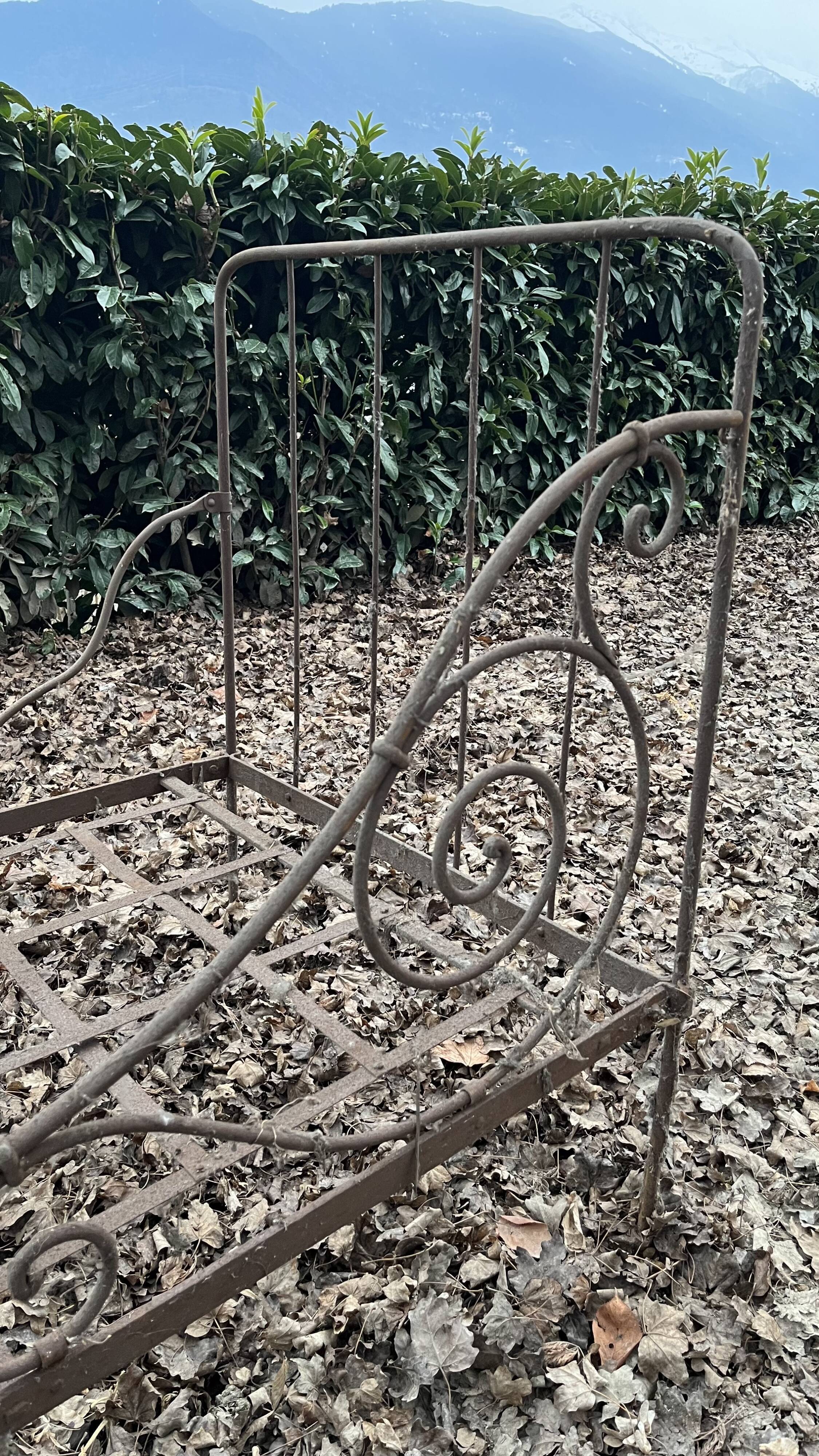 Folding wrought iron bed 1900