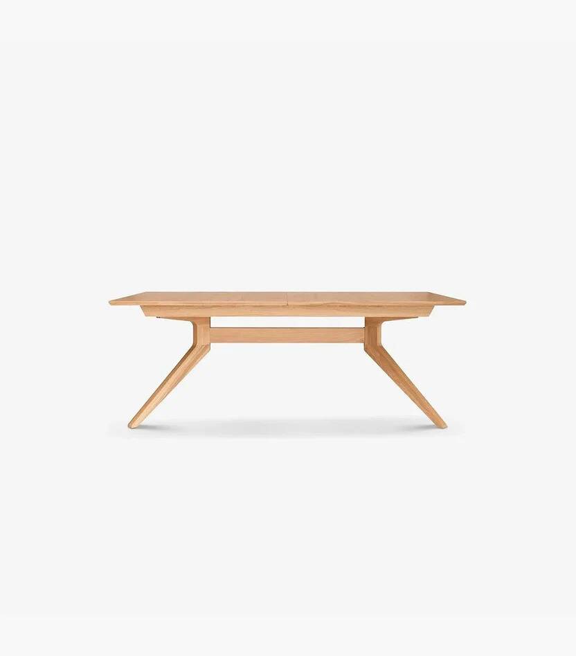 Wooden dining table with a cross extension.