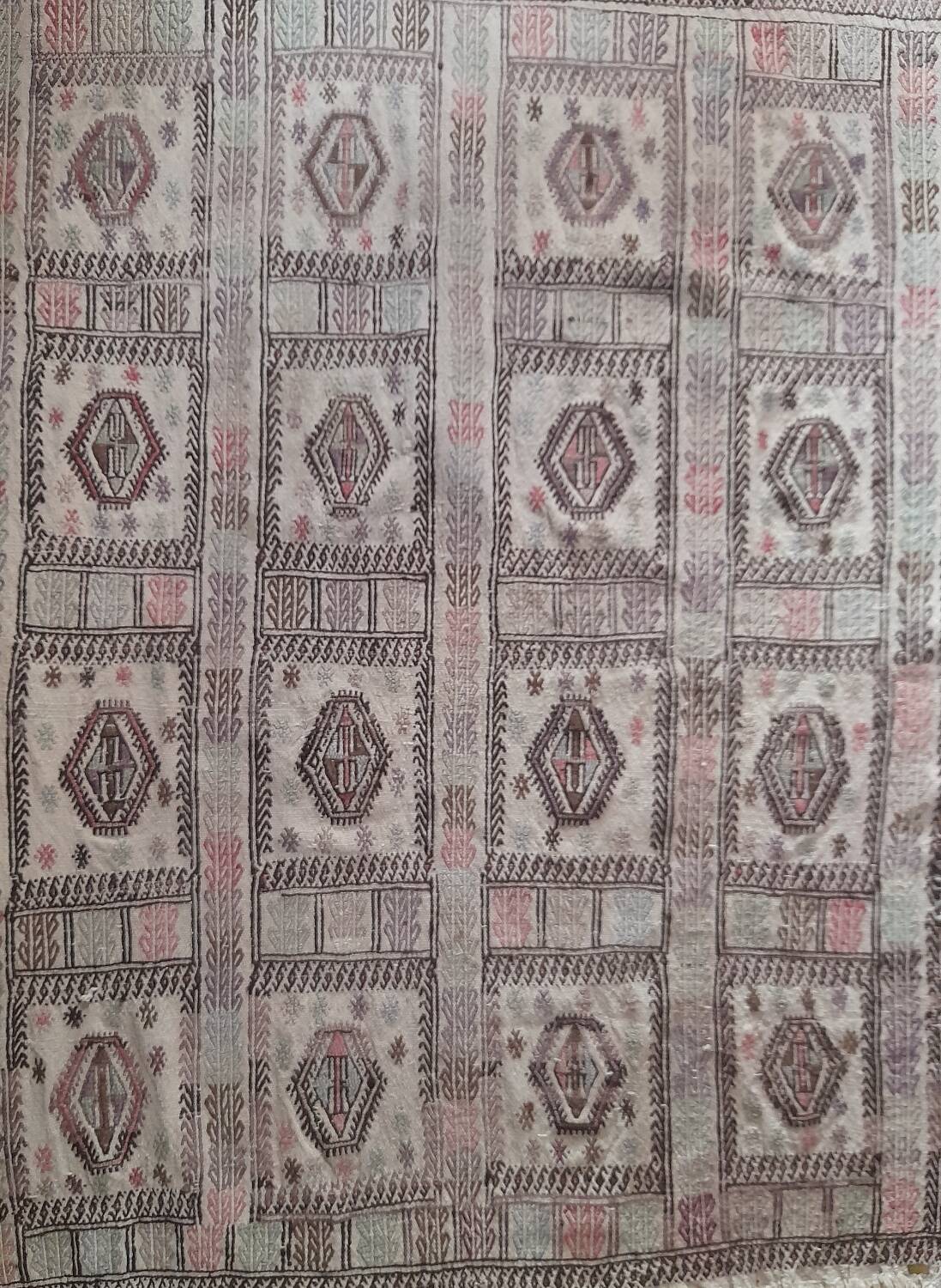 Antique embroidered kilim with 16 medallions from Turkey or the Balkans, c. 1950.