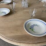 Oval table with integrated extension