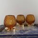 Set of three vintage wall or ceiling lights in amber chiseled glass