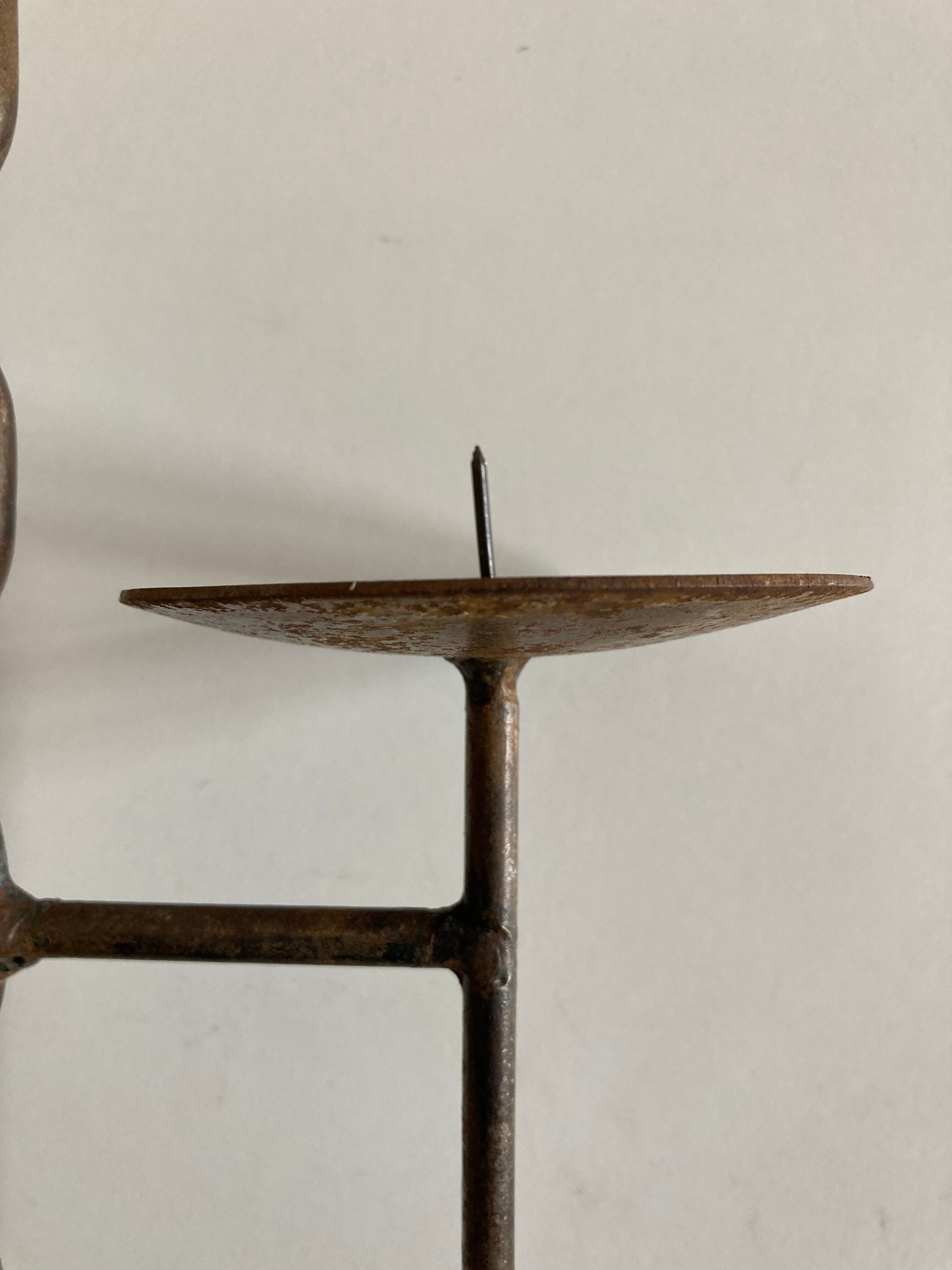 Raw beaten iron candlestick 1970