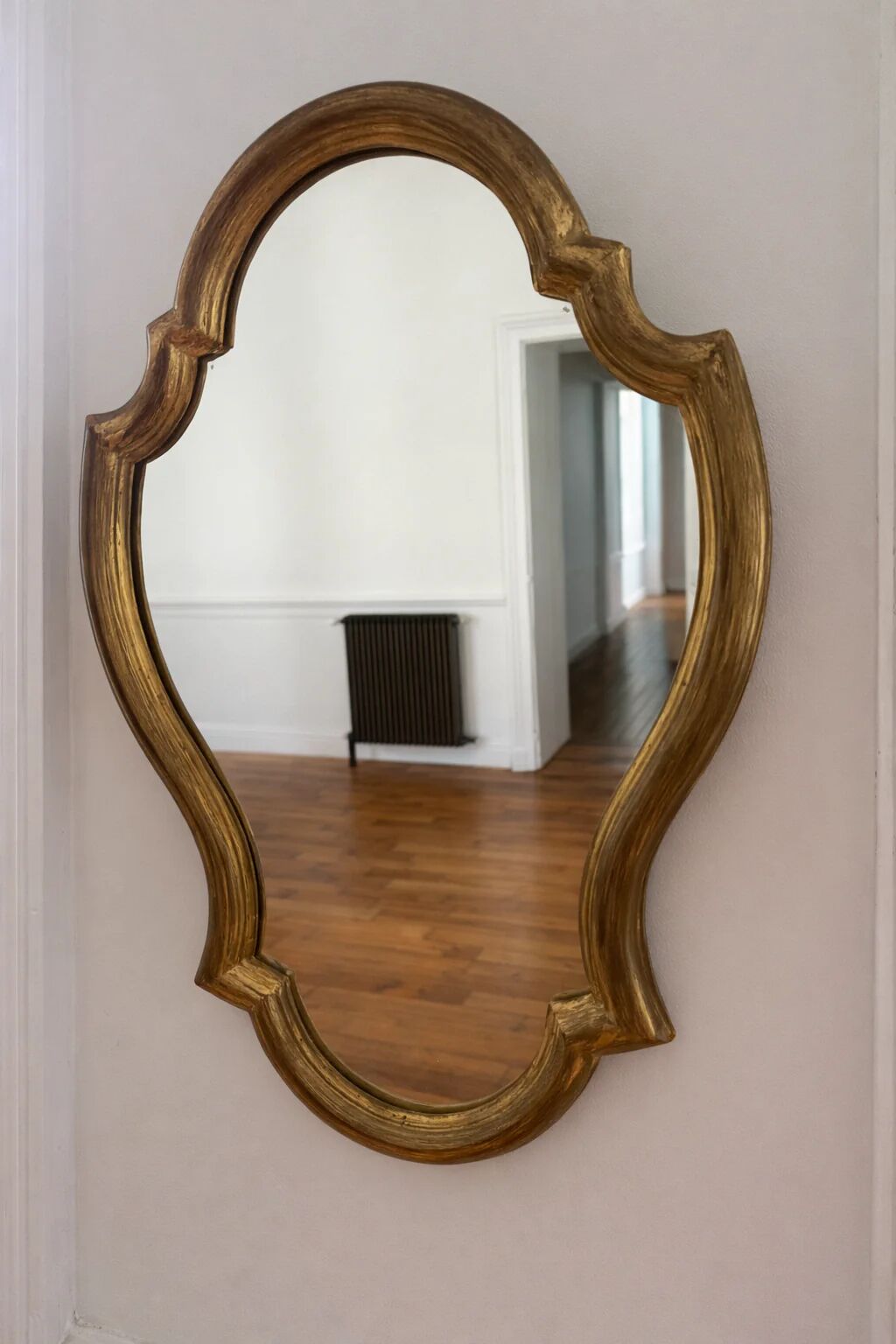 Baroque mirror in gilded wood
