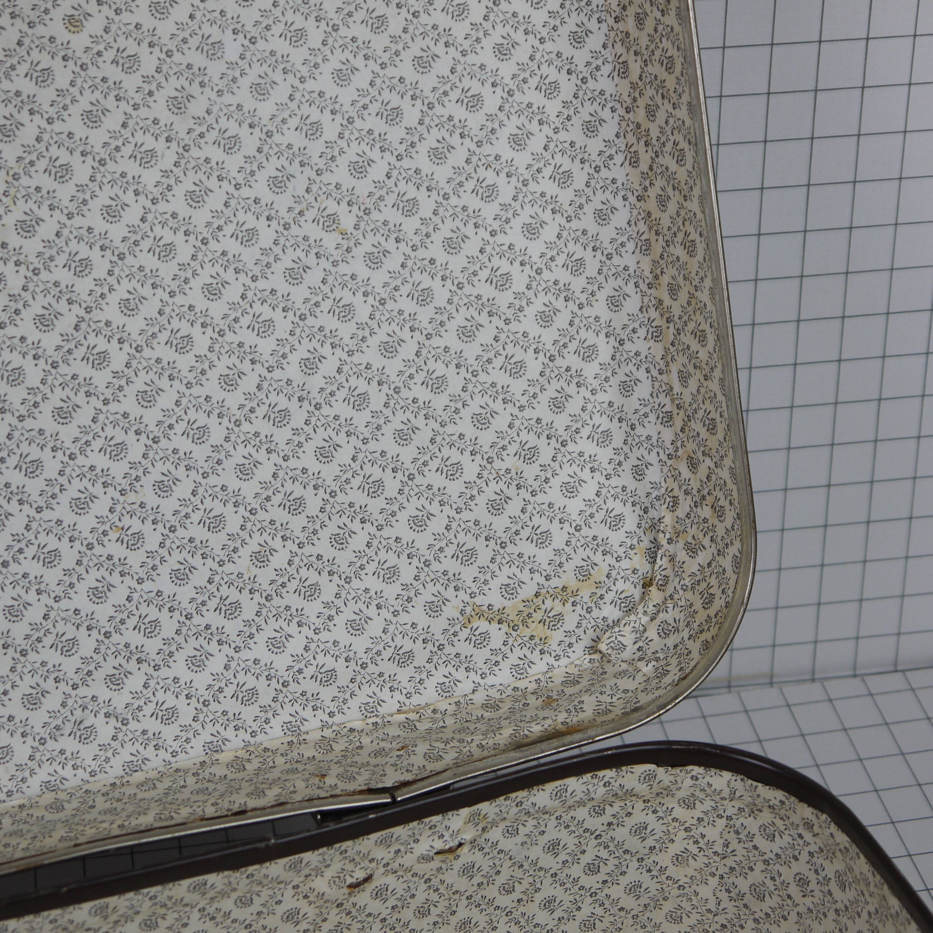 Cardboard and brown leather case