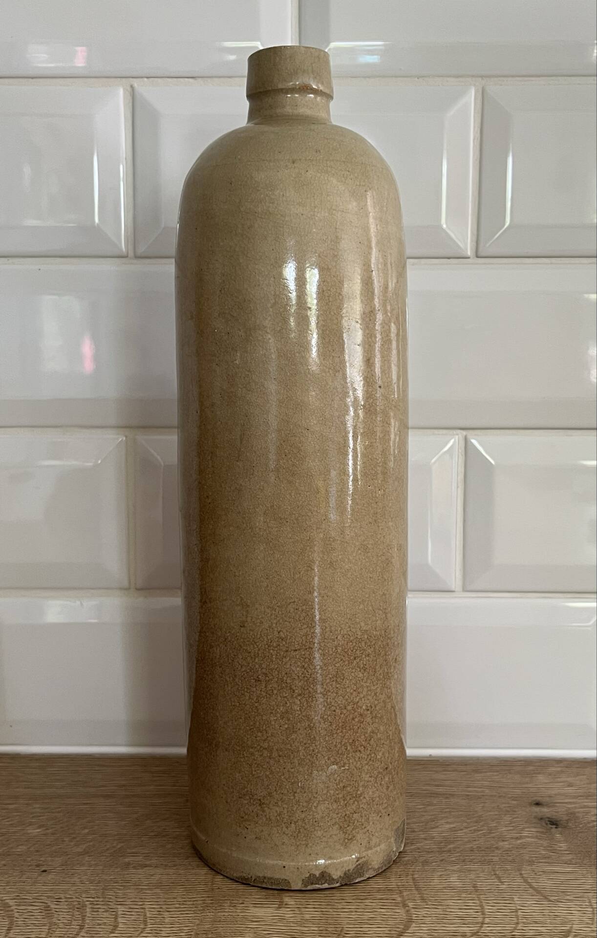 Beige stoneware bottle vase