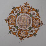 Two 18th century earthenware plates with grand feu decoration in ochre, green and manganese
