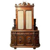 Important two-body buffet from a hunting lodge in carved walnut, Renaissance style.