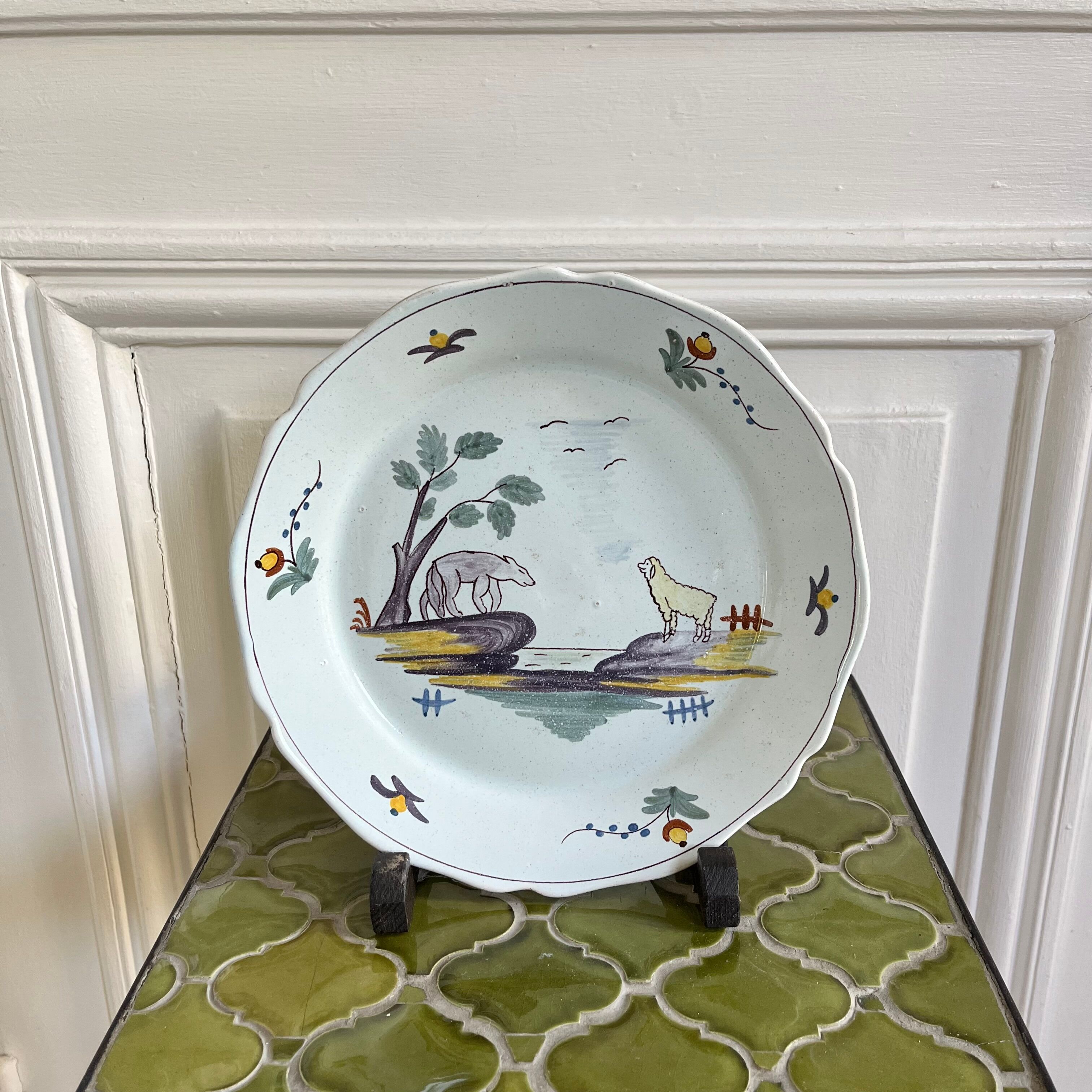 Decorative ceramic plate with "The Wolf and the Lamb" design