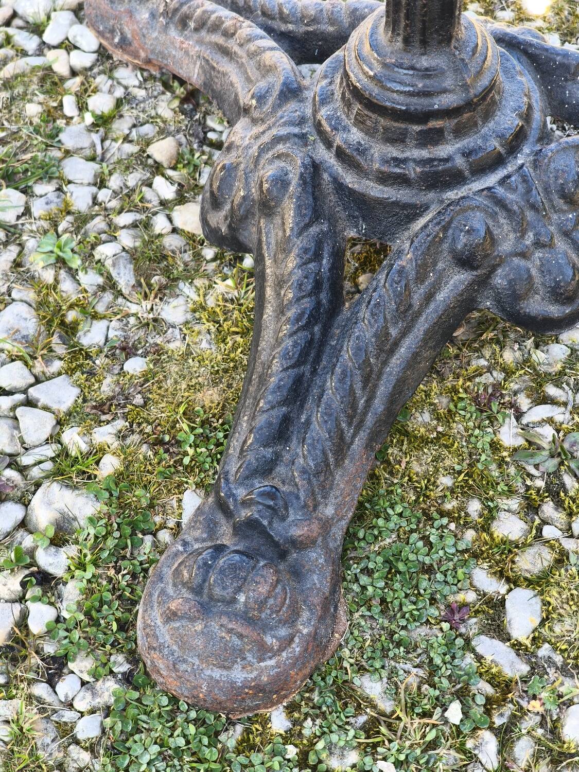 Marble bistro table with cast iron legs in Parisian café style