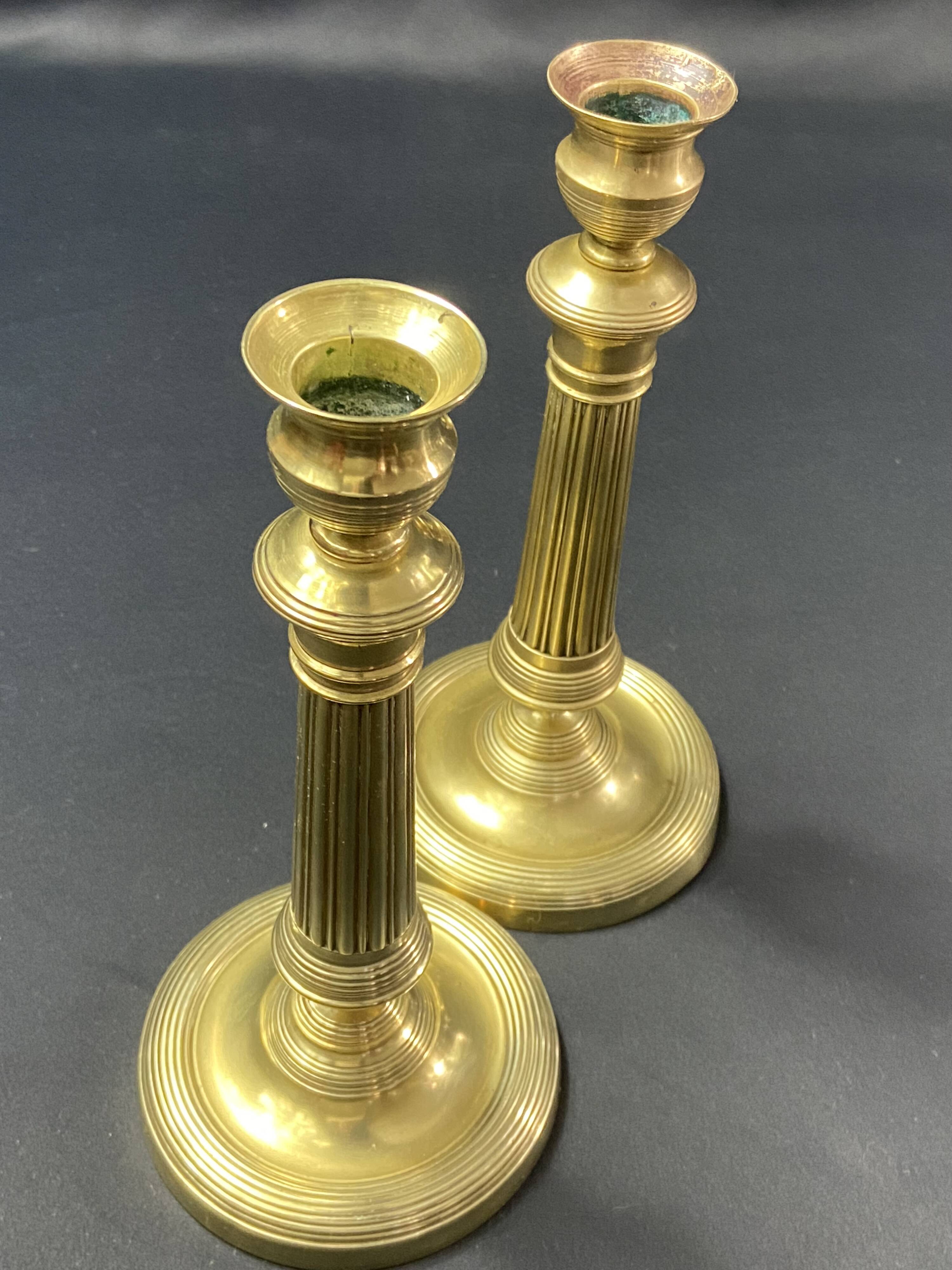 Pair of 19th century gilt bronze candlesticks with fluted shafts, Restoration