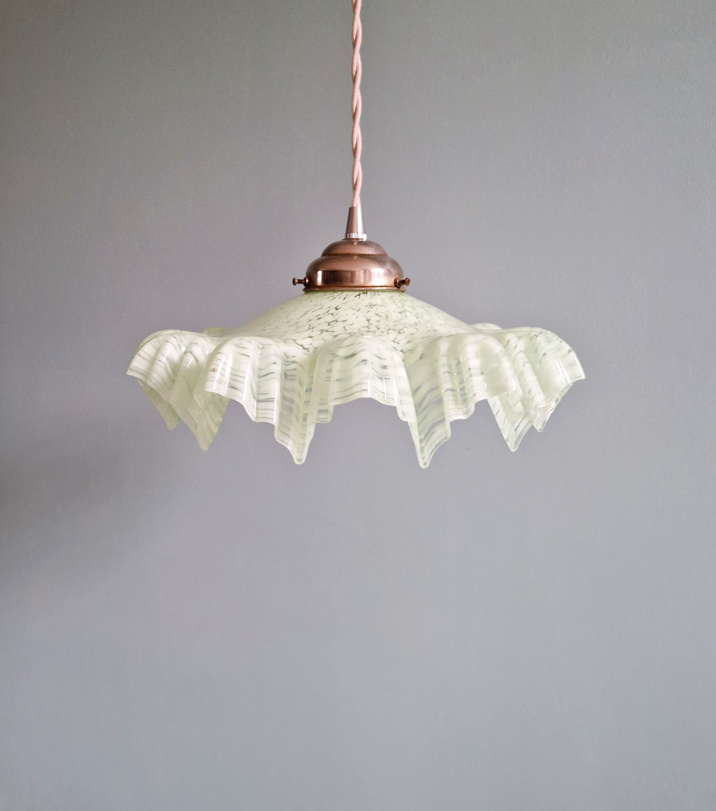 Art Deco pendant light in speckled green and white pleated glass, 1920s-30s.