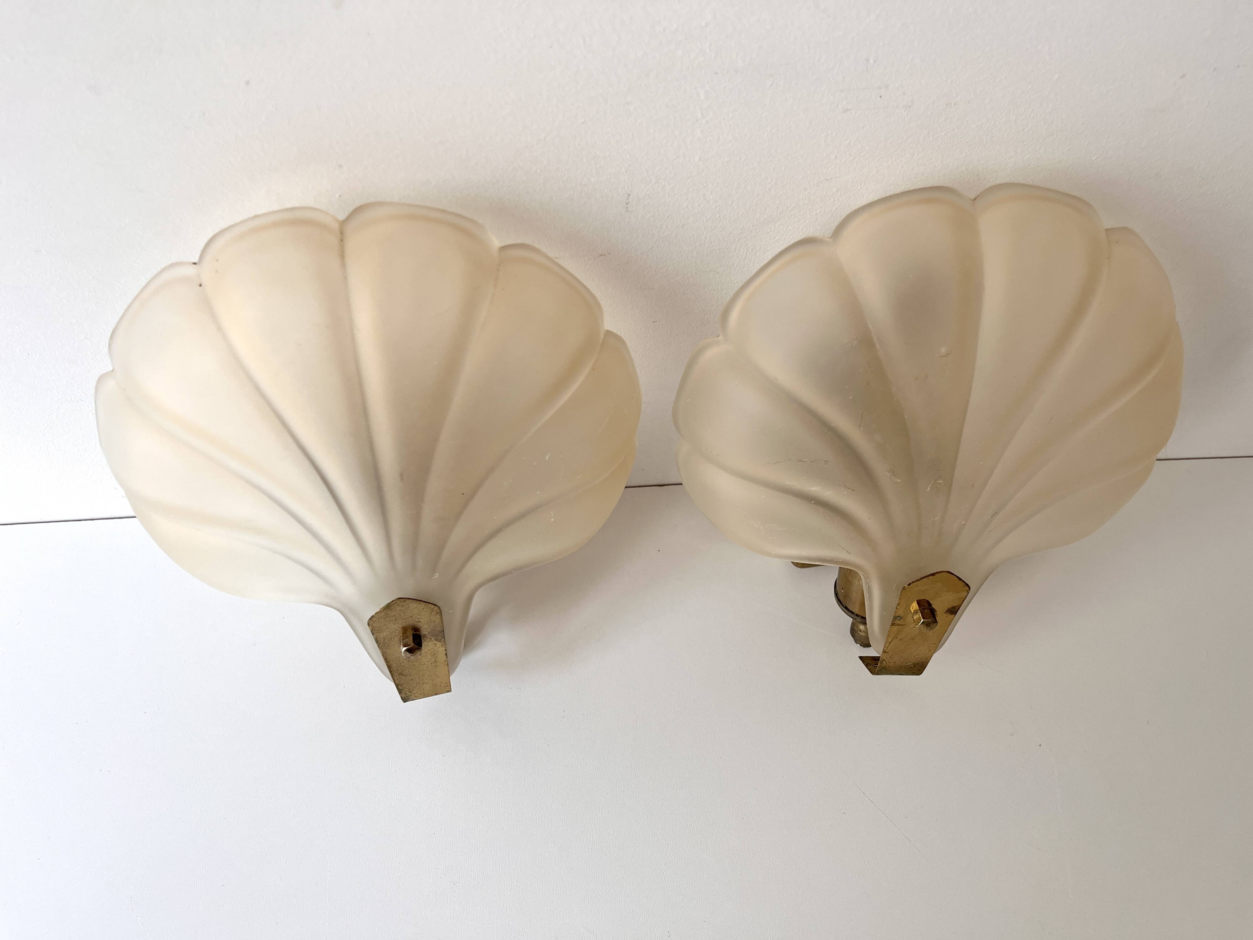Pair of vintage shell glass wall lights, Art Deco style fixtures.