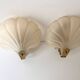 Pair of vintage shell glass wall lights, Art Deco style fixtures.
