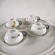4 cups and cups in fine Limoges porcelain signed LC 60s