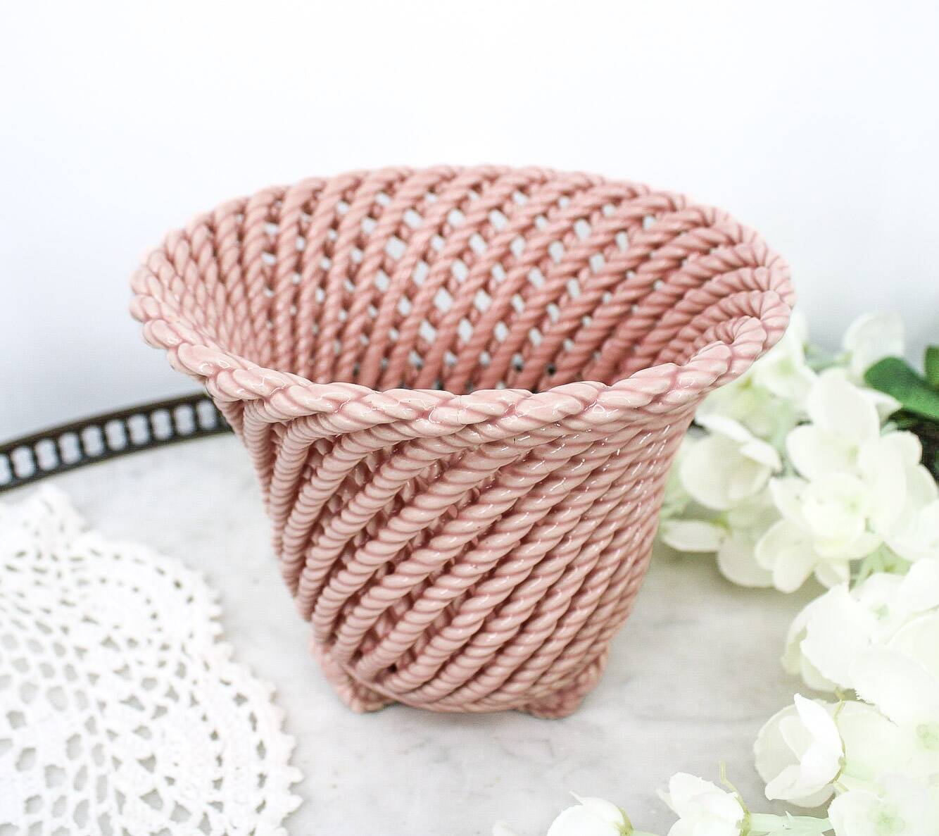 Small vintage handmade plant pot in pink woven ceramic