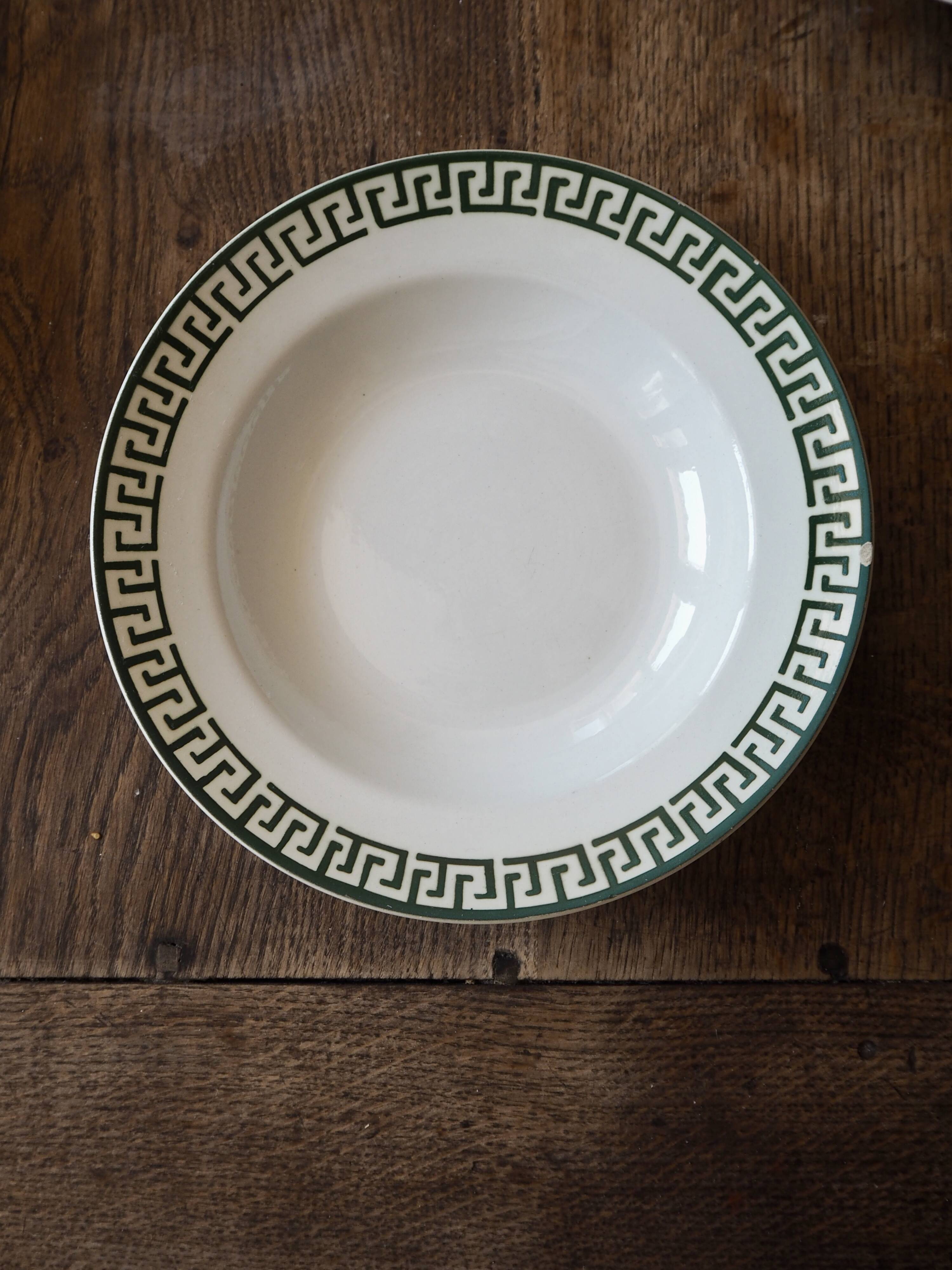 Set of 12 green patterned soup plates, Badonviller earthenware