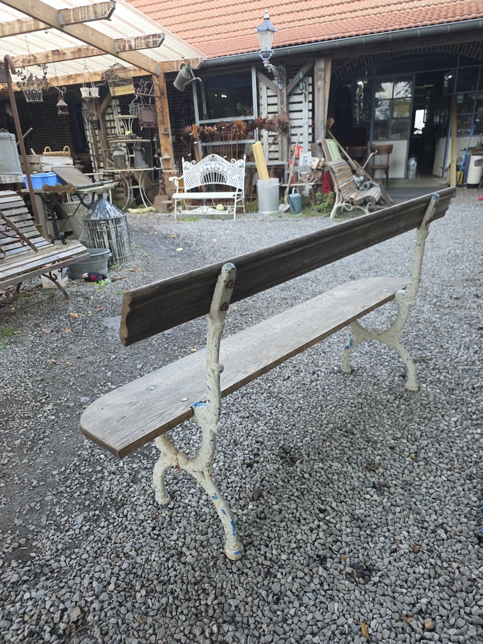 Old garden bench in cast iron and oak