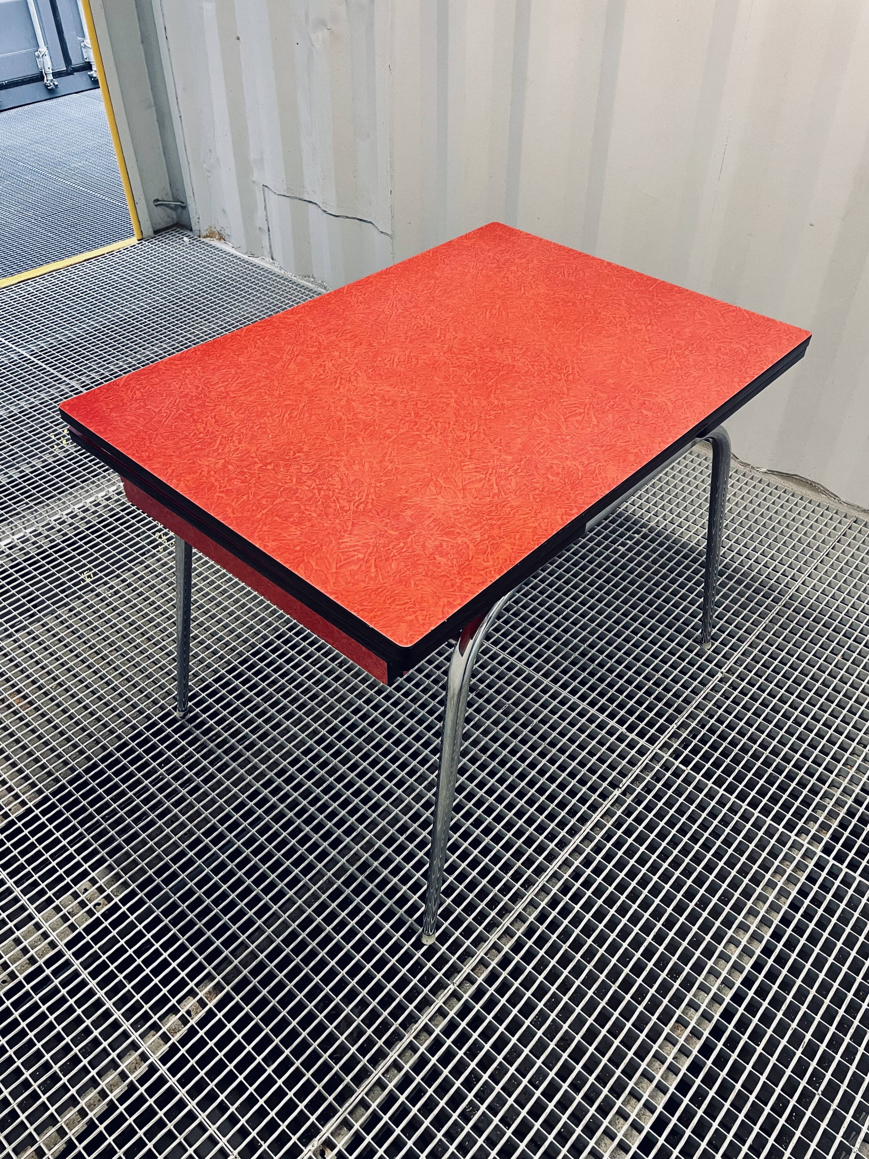Vintage red formica table from the 60s with extensions