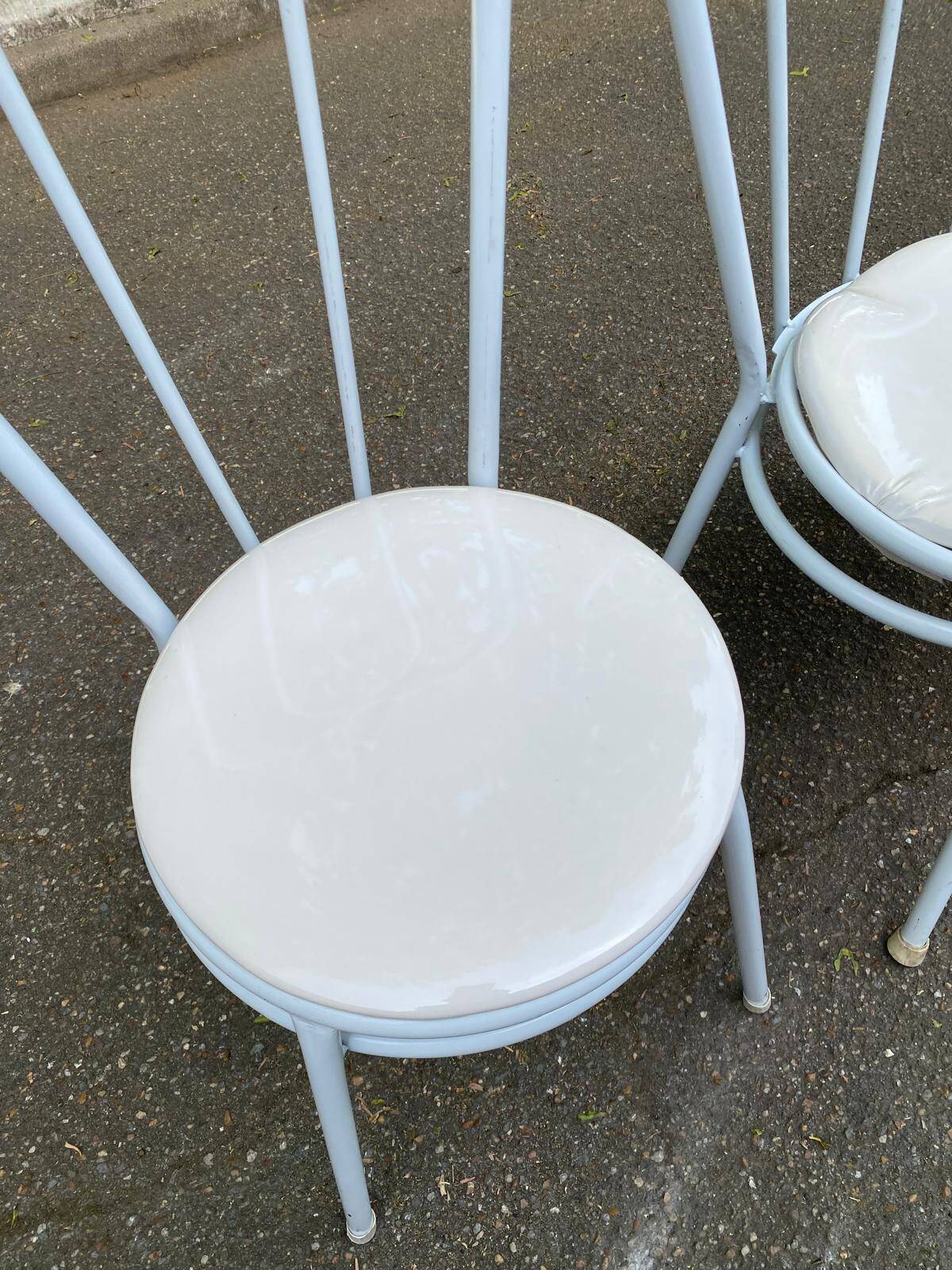 3 white steel and beige leather bistro chairs