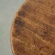 Round antique side/wine table from the late 18th century with a subtle foot