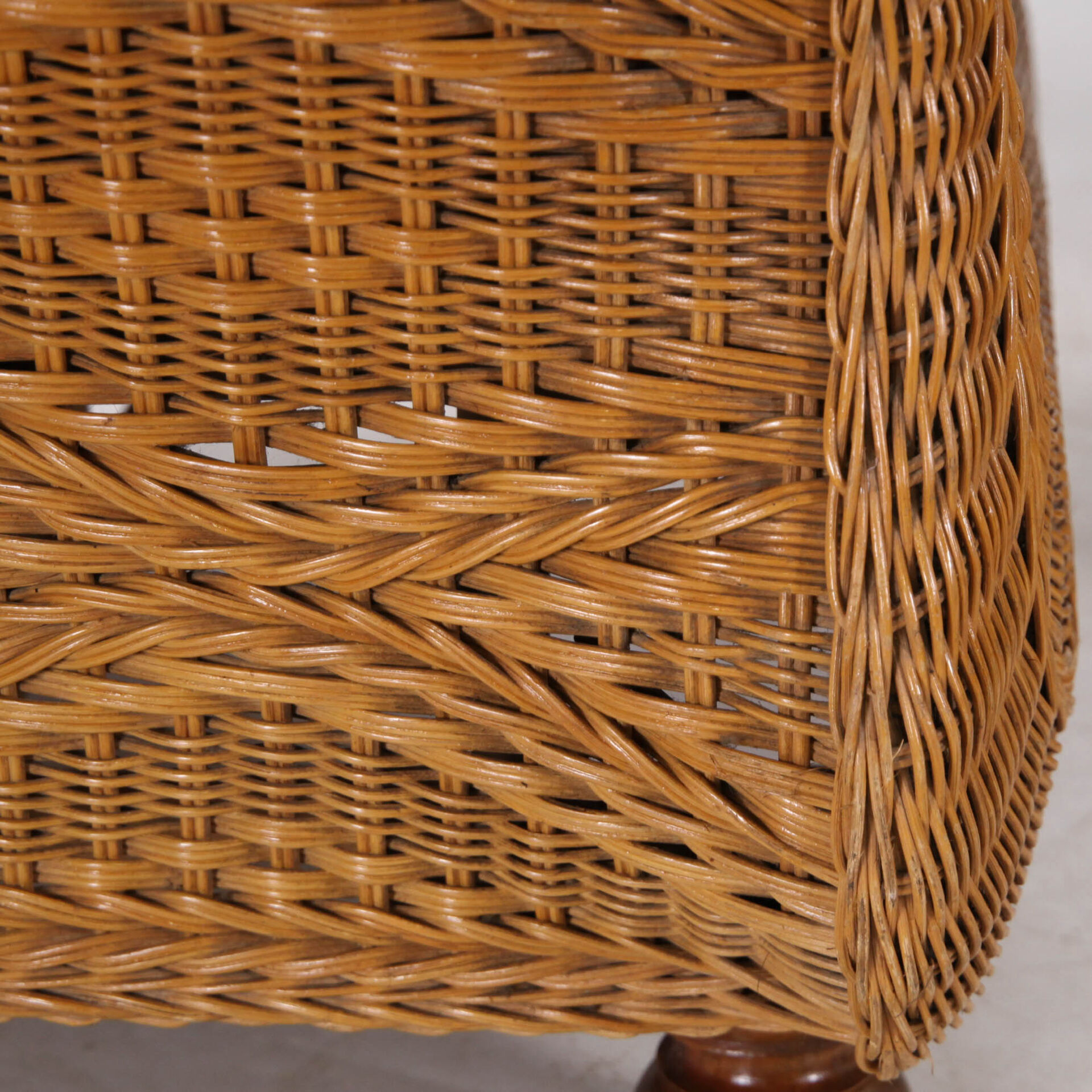 Pair of woven wicker armchairs