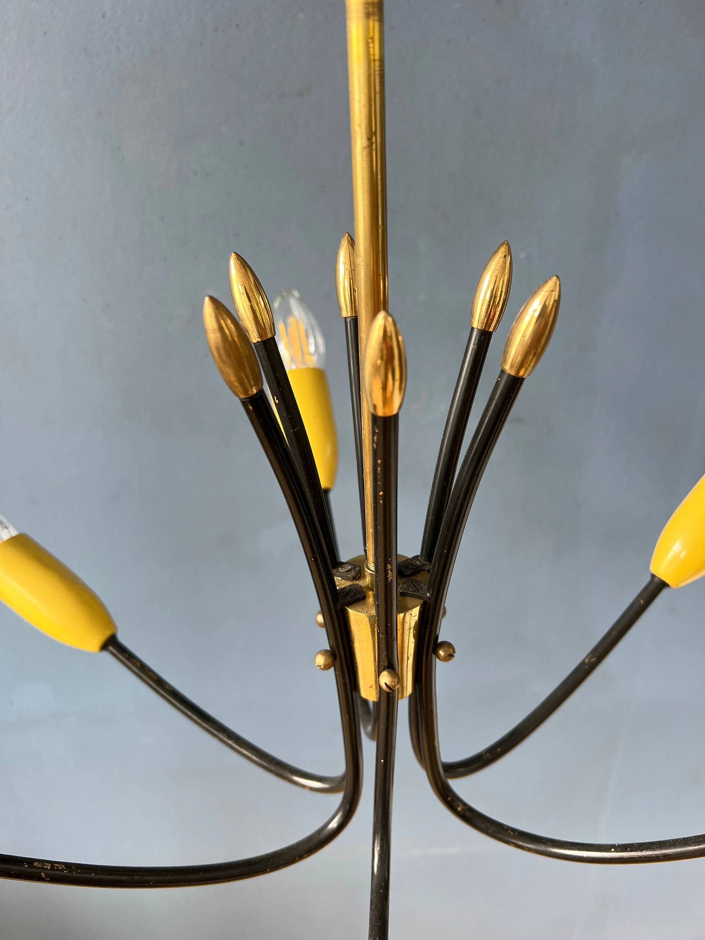 Vintage yellow spider suspension from the 1950s.
