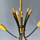 Vintage yellow spider suspension from the 1950s.