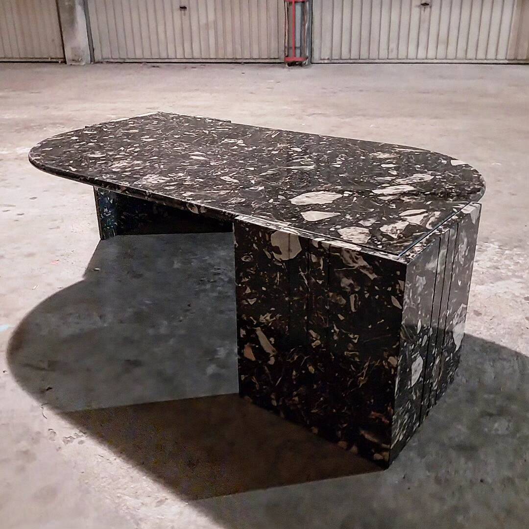 Black travertine eye coffee table