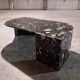Black travertine eye coffee table