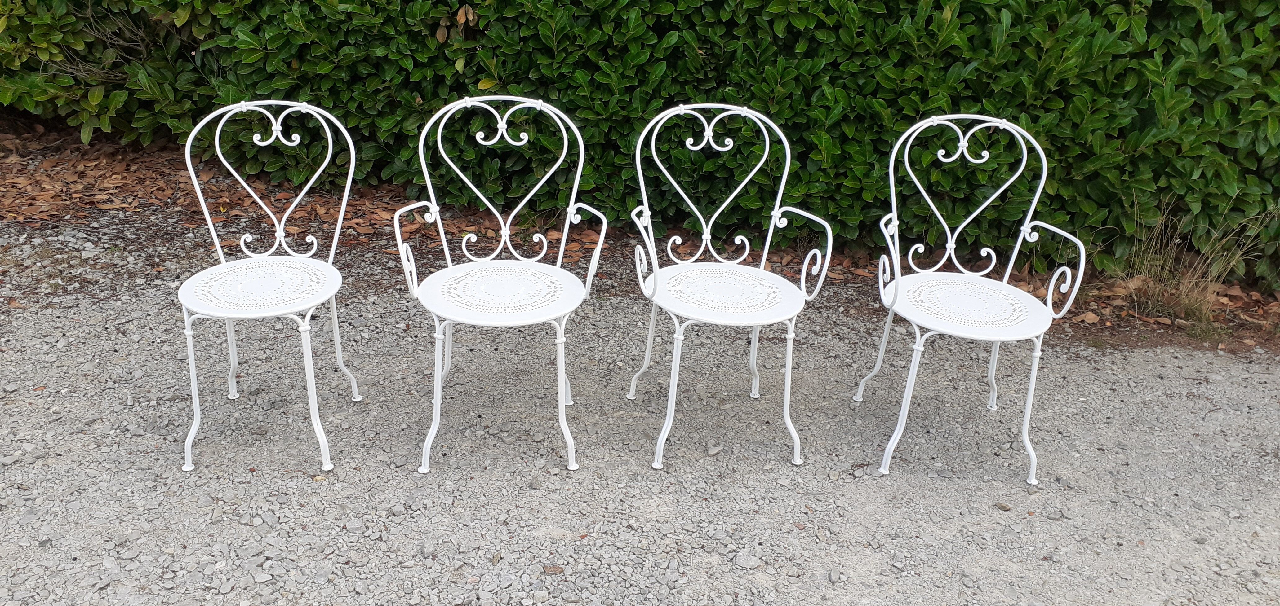 Old white wrought iron garden room