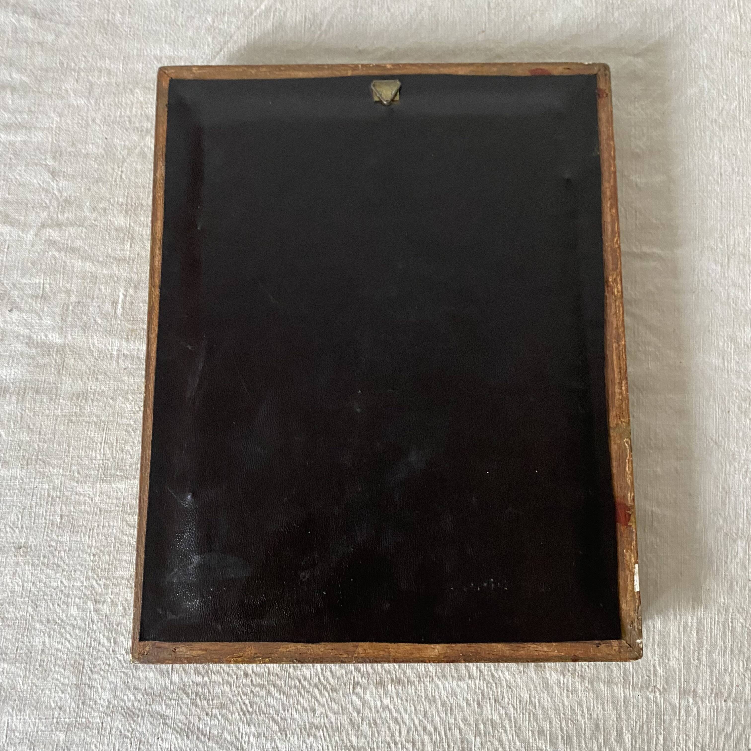 Small molded gilded mirror
